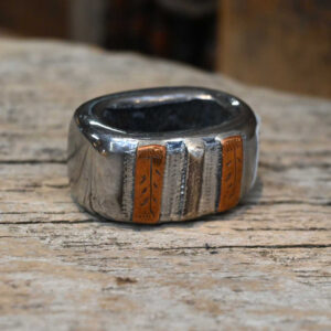 Silver and copper mounted saddle horn knot